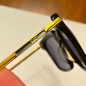 McQ by Alexander McQueen Sunglasses. Golden mirrored McQ by Alexander McQueen